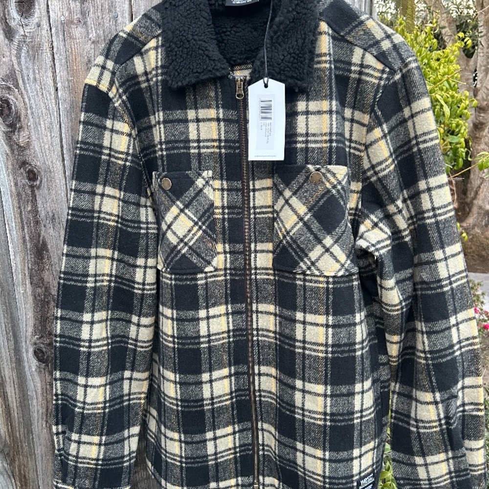 Sherpa collar. Brand new with tags. Black and tan plaid.